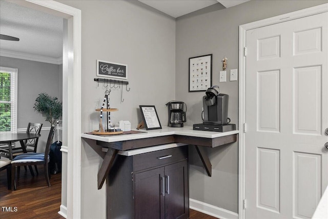 9801 Honeycutt Rd, Raleigh, NC 27614 - bar featuring dark wood-style flooring, ornamental molding, and baseboards