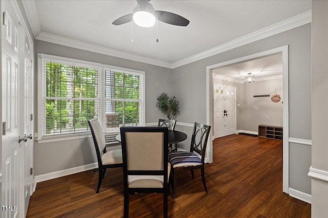 9801 Honeycutt Rd, Raleigh, NC 27614 - dining room with wood finished floors, a ceiling fan, crown molding, and baseboards