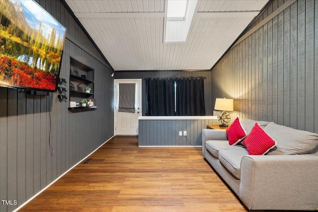 9801 Honeycutt Rd, Raleigh, NC 27614 - sitting room with lofted ceiling, wood finished floors, built in features, and wood walls