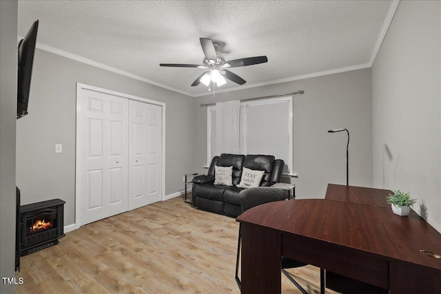 9801 Honeycutt Rd, Raleigh, NC 27614 - office featuring light wood finished floors, ceiling fan, a textured ceiling, ornamental molding, and baseboards