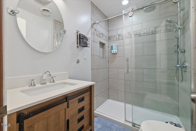 9801 Honeycutt Rd, Raleigh, NC 27614 - full bathroom featuring a stall shower, vanity, and toilet