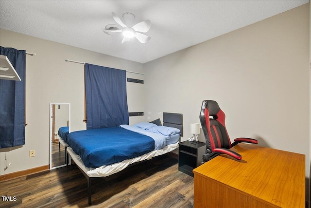 9801 Honeycutt Rd, Raleigh, NC 27614 - bedroom with wood finished floors, baseboards, and a ceiling fan