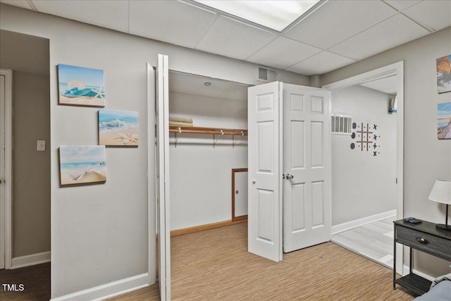 9801 Honeycutt Rd, Raleigh, NC 27614 - corridor with baseboards and a drop ceiling