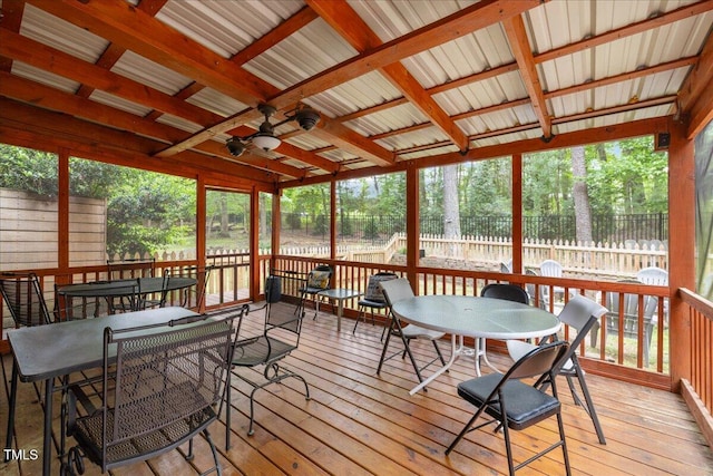 9801 Honeycutt Rd, Raleigh, NC 27614 - sunroom / solarium featuring outdoor dining area, a ceiling fan, and view of wooded area