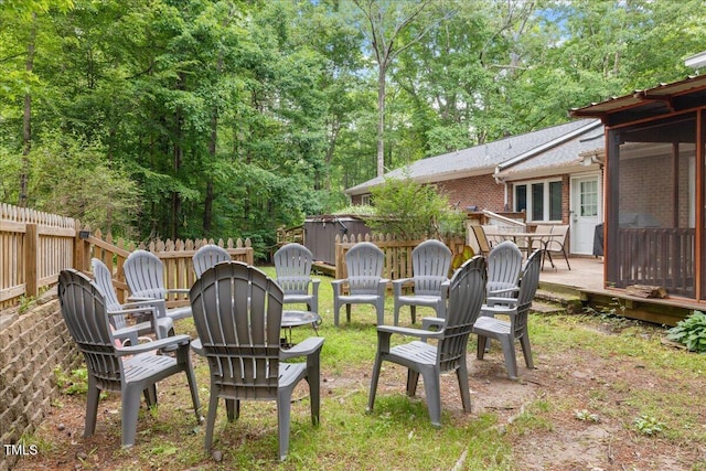 9801 Honeycutt Rd, Raleigh, NC 27614 - view of yard featuring a deck and an outdoor fire pit
