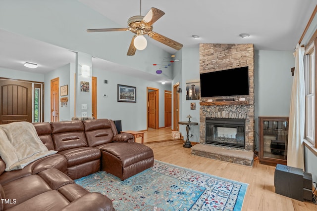 502 Hillcrest Rd, Apex, NC 27502 - living room featuring a ceiling fan, lofted ceiling, a fireplace, and wood finished floors