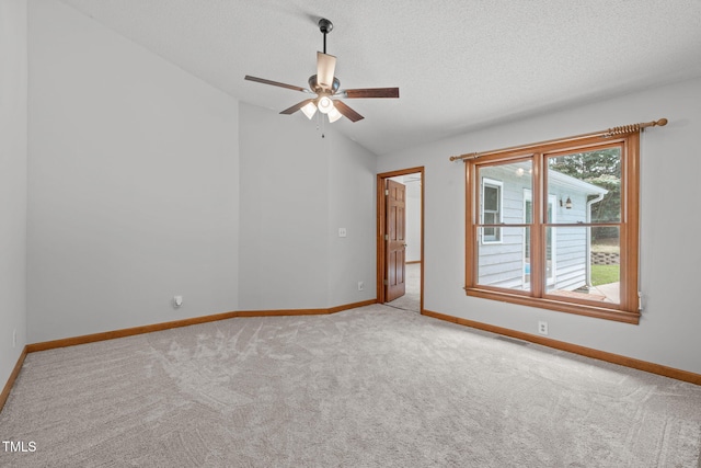 502 Hillcrest Rd, Apex, NC 27502 - carpeted spare room with a ceiling fan, vaulted ceiling, and a textured ceiling