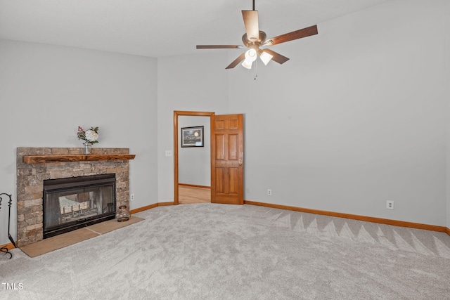 502 Hillcrest Rd, Apex, NC 27502 - carpeted living room with ceiling fan, a fireplace, and a high ceiling