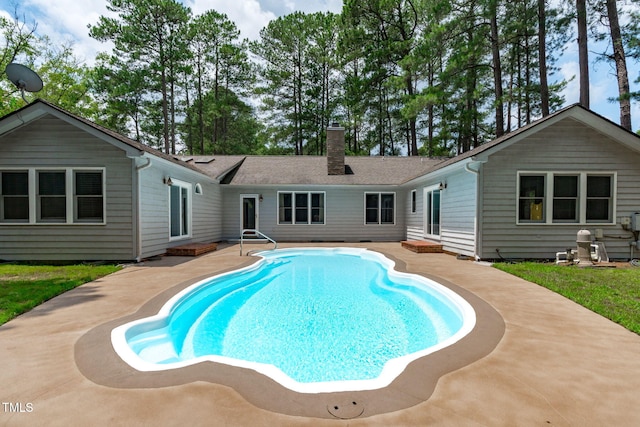 502 Hillcrest Rd, Apex, NC 27502 - rear view of property featuring a chimney, an outdoor pool, a patio, and entry steps