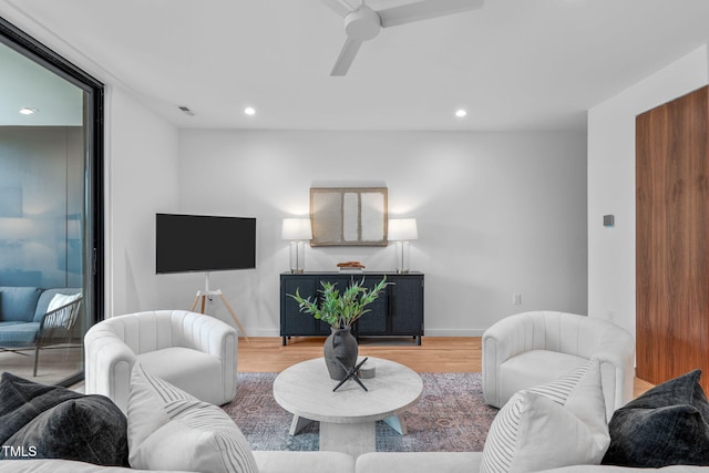 511 S Bloodworth St Unit 104, Raleigh, NC 27601 - living area with wood finished floors, baseboards, recessed lighting, and ceiling fan