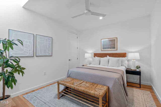 511 S Bloodworth St Unit 104, Raleigh, NC 27601 - bedroom with baseboards, wood finished floors, recessed lighting, and ceiling fan