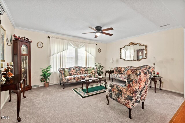 4403 Jeffries Rd, Durham, NC 27704 - living area with a ceiling fan, a textured ceiling, carpet, crown molding, and baseboards