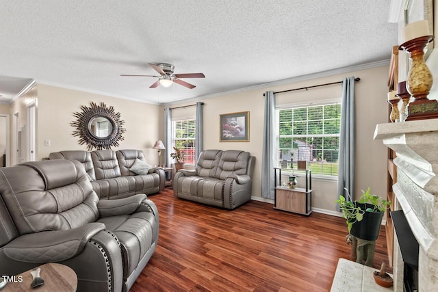 4403 Jeffries Rd, Durham, NC 27704 - living room featuring a fireplace, crown molding, ceiling fan, wood finished floors, and baseboards