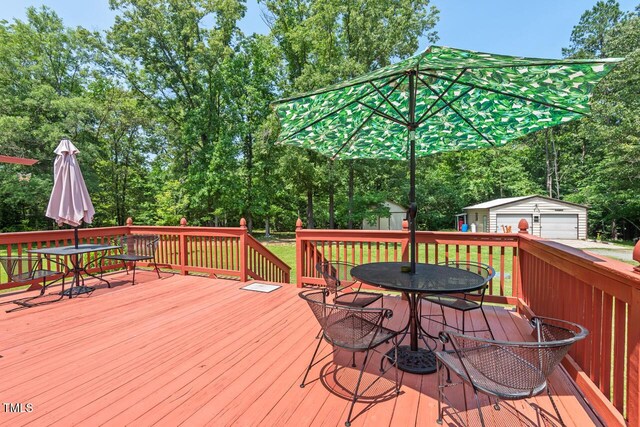 4403 Jeffries Rd, Durham, NC 27704 - wooden terrace featuring outdoor dining area and view of scattered trees