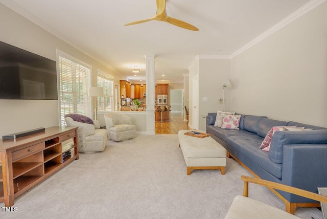 1005 Hidden River Ct, Raleigh, NC 27614 - living area featuring decorative columns, ornamental molding, light colored carpet, and ceiling fan