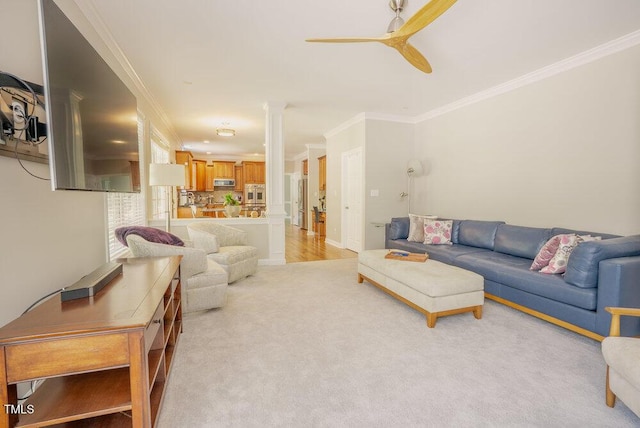 1005 Hidden River Ct, Raleigh, NC 27614 - living area featuring decorative columns, ornamental molding, light colored carpet, and a ceiling fan