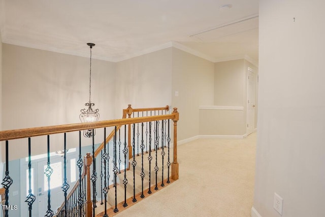 1005 Hidden River Ct, Raleigh, NC 27614 - hall featuring an upstairs landing, baseboards, carpet, attic access, and crown molding