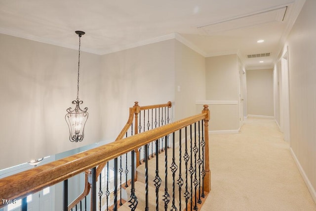 1005 Hidden River Ct, Raleigh, NC 27614 - hallway with an upstairs landing, attic access, light carpet, baseboards, and ornamental molding