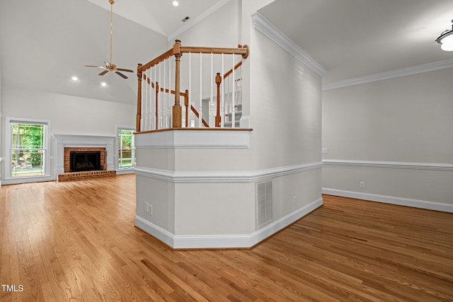 5108 Briton Pl, Fuquay Varina, NC 27526 - hall featuring wood finished floors, baseboards, ornamental molding, vaulted ceiling, and stairs