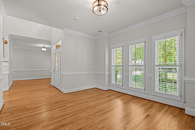 5108 Briton Pl, Fuquay Varina, NC 27526 - unfurnished room featuring light wood-style flooring, healthy amount of natural light, crown molding, and baseboards