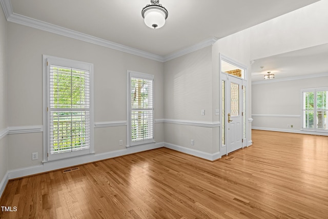 5108 Briton Pl, Fuquay Varina, NC 27526 - empty room with wood finished floors, crown molding, and baseboards
