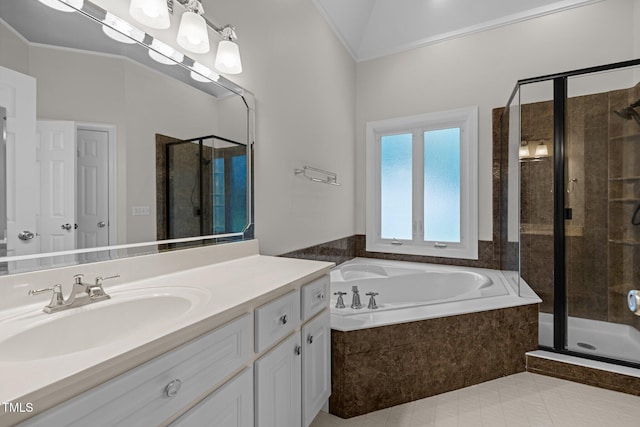 5108 Briton Pl, Fuquay Varina, NC 27526 - bathroom with vanity, a shower stall, a garden tub, tile patterned floors, and crown molding