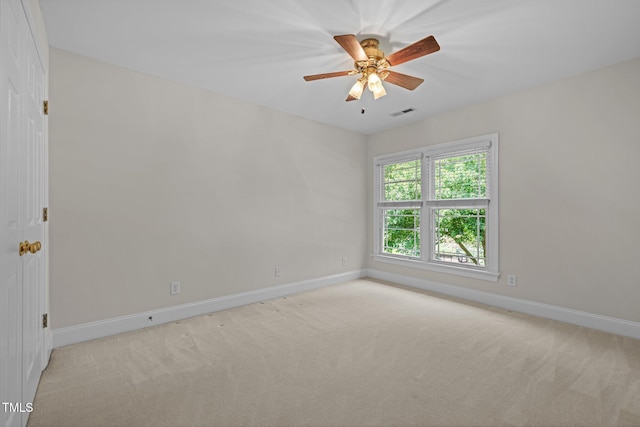 5108 Briton Pl, Fuquay Varina, NC 27526 - empty room with light carpet, baseboards, and a ceiling fan