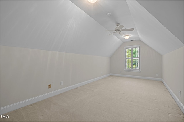 5108 Briton Pl, Fuquay Varina, NC 27526 - additional living space featuring lofted ceiling, light colored carpet, baseboards, and a ceiling fan
