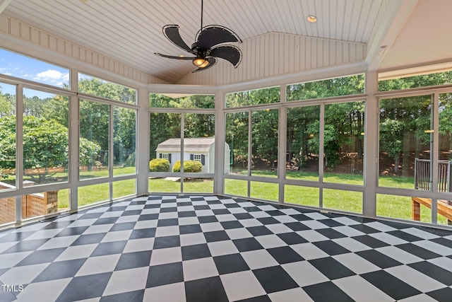 5108 Briton Pl, Fuquay Varina, NC 27526 - unfurnished sunroom with a ceiling fan, vaulted ceiling, and view of scattered trees