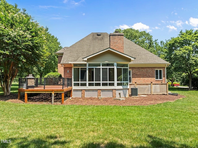 5108 Briton Pl, Fuquay Varina, NC 27526 - rear view of house with a sunroom, brick siding, a deck, and roof with shingles