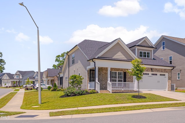 3020 High Plains Dr, Fuquay Varina, NC 27526 - view of front of property with covered porch, concrete driveway, a front yard, a garage, and a residential view
