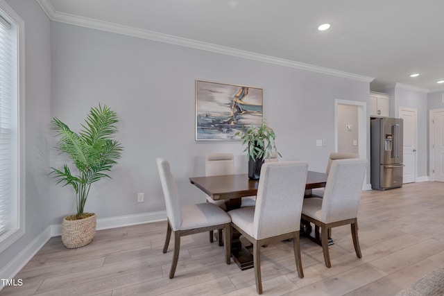 3020 High Plains Dr, Fuquay Varina, NC 27526 - dining room with crown molding, baseboards, light wood finished floors, recessed lighting, and healthy amount of natural light