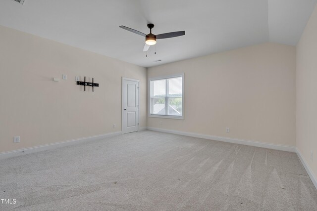 3020 High Plains Dr, Fuquay Varina, NC 27526 - spare room featuring a ceiling fan, light carpet, baseboards, and vaulted ceiling