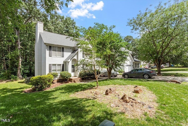 4108 Lazyriver Ln, Durham, NC 27712 - view of property hidden behind natural elements featuring a chimney, a front lawn, driveway, and a garage