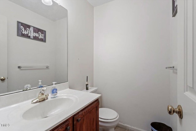 4108 Lazyriver Ln, Durham, NC 27712 - half bathroom featuring toilet and vanity