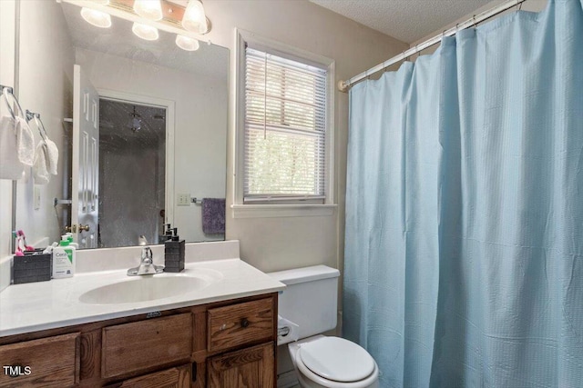 4108 Lazyriver Ln, Durham, NC 27712 - full bathroom with vanity, toilet, and a textured ceiling
