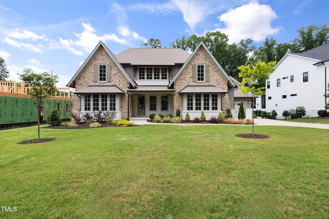 1212 Gunnison Pl, Raleigh, NC 27609 - rear view of house featuring a yard and a shingled roof