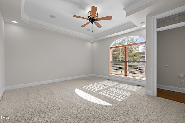 4913 Great Meadows Ct, Raleigh, NC 27609 - carpeted empty room with a tray ceiling, ornamental molding, recessed lighting, baseboards, and a ceiling fan