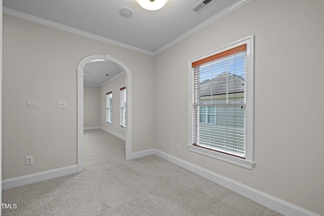 4913 Great Meadows Ct, Raleigh, NC 27609 - carpeted spare room with ornamental molding, baseboards, and arched walkways