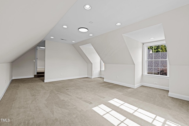 4913 Great Meadows Ct, Raleigh, NC 27609 - additional living space with light colored carpet, lofted ceiling, recessed lighting, and baseboards