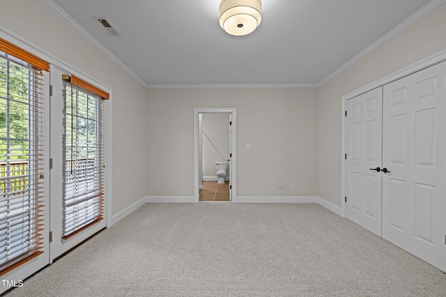 4913 Great Meadows Ct, Raleigh, NC 27609 - unfurnished bedroom with ornamental molding, access to exterior, light carpet, baseboards, and a closet