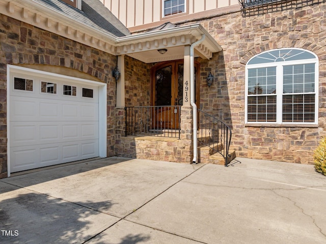 4913 Great Meadows Ct, Raleigh, NC 27609 - entrance to property featuring stone siding, board and batten siding, and driveway