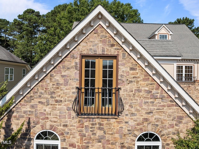 4913 Great Meadows Ct, Raleigh, NC 27609 - exterior view of stone siding and french doors