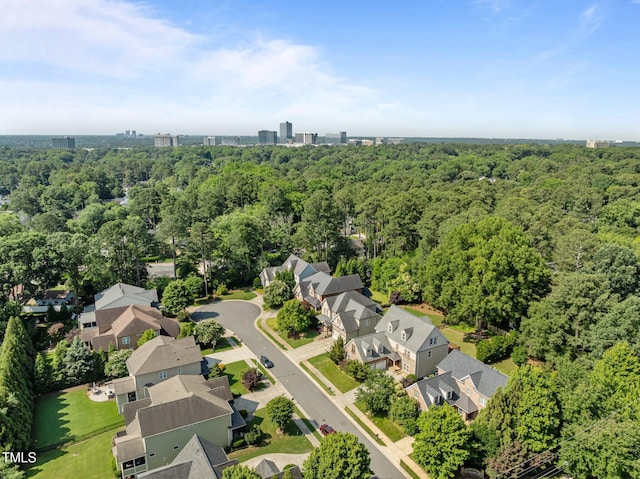 4913 Great Meadows Ct, Raleigh, NC 27609 - aerial perspective of suburban area with a heavily wooded area