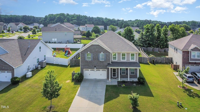 1305 Ivey Grove Ct, Fuquay Varina, NC 27526 - view of front facade with a residential view, concrete driveway, and an attached garage