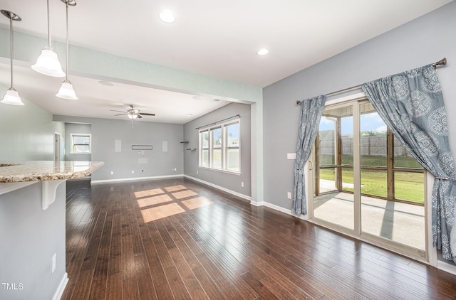 1305 Ivey Grove Ct, Fuquay Varina, NC 27526 - unfurnished living room featuring a ceiling fan, dark wood-style floors, and recessed lighting