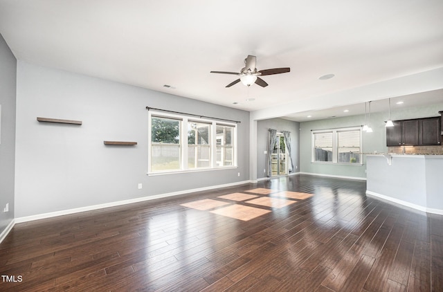 1305 Ivey Grove Ct, Fuquay Varina, NC 27526 - unfurnished living room with a ceiling fan, dark wood-style floors, plenty of natural light, and recessed lighting