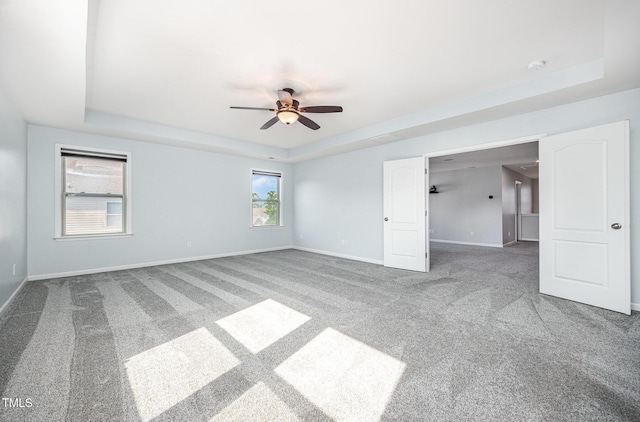 1305 Ivey Grove Ct, Fuquay Varina, NC 27526 - carpeted spare room with a raised ceiling, ceiling fan, and a smoke detector