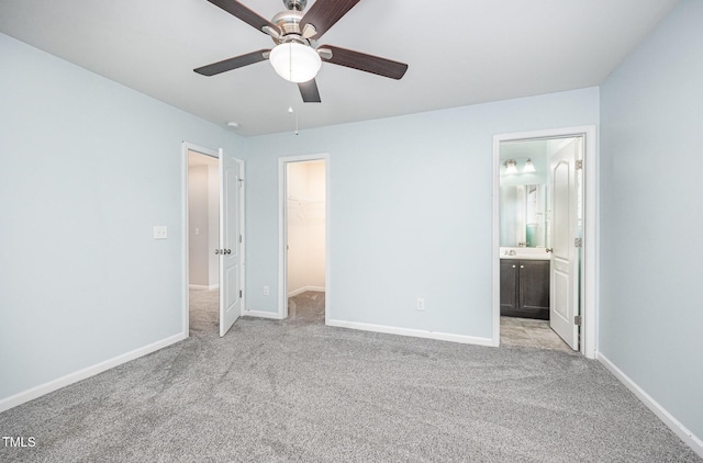 1305 Ivey Grove Ct, Fuquay Varina, NC 27526 - unfurnished bedroom with a spacious closet, carpet floors, a closet, and ensuite bathroom