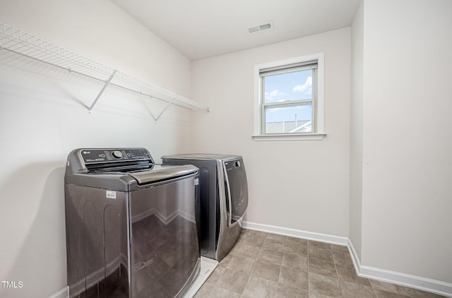 1305 Ivey Grove Ct, Fuquay Varina, NC 27526 - laundry area featuring independent washer and dryer and baseboards